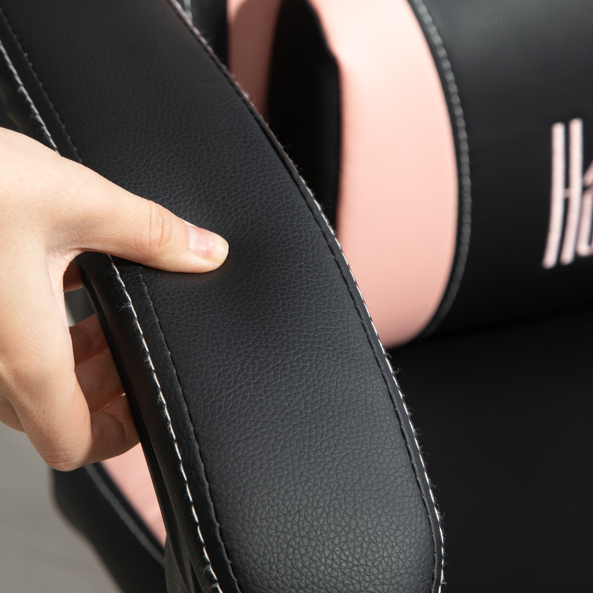 Experience Ultimate Comfort with the Ergonomic Racing Gaming Chair Featuring Recline and Footrest in Sleek Black Faux Leather