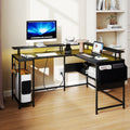 Elevate Your Gaming Experience with Our L-Shaped Gaming Desk Featuring LED Lights and Power Outlets
